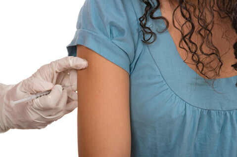 Woman getting allergy shot