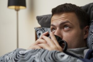 man laying in bed
